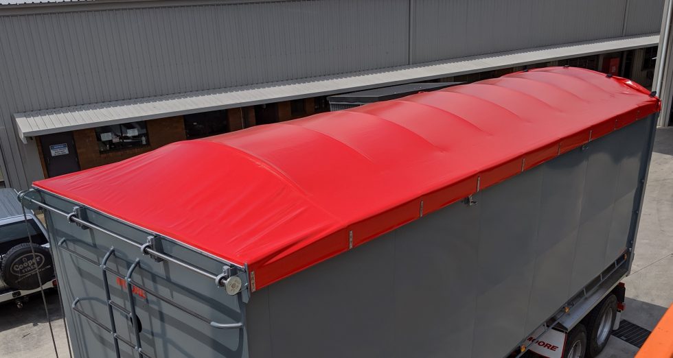 WATERPROOF HOOD TARP SYSTEMS Retractable Tarps