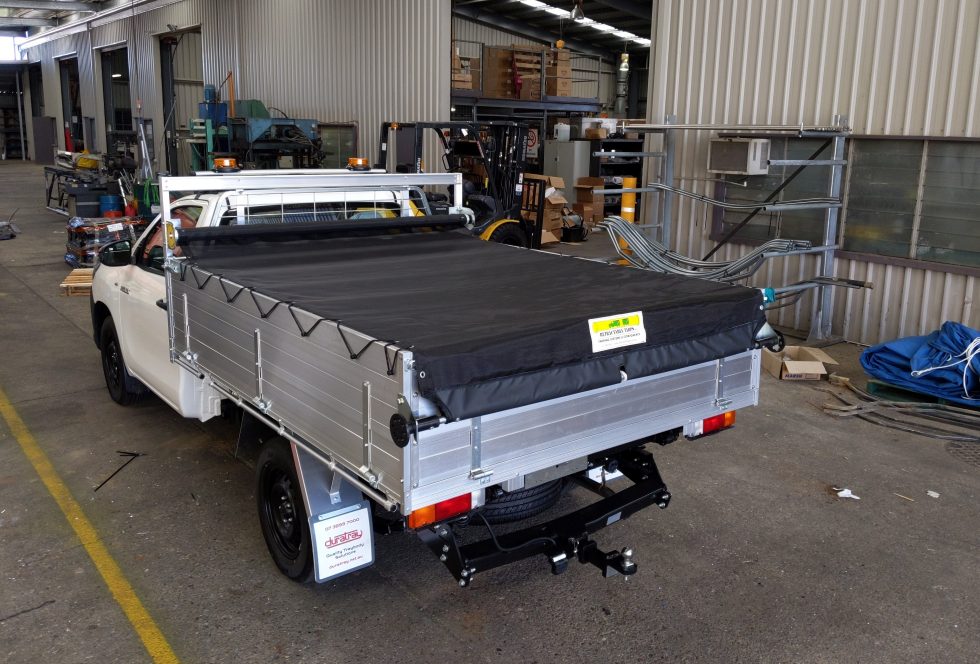 PULL OUT TARP SYSTEM Retractable Tarps